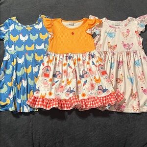 Lot of 3 farm themed dresses 4t-5t (110) chickens and farm scene summer dresses